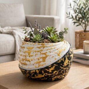 Artisan Curve white and gold decorative organizer styled as a centrepiece with dried botanicals on a coffee table